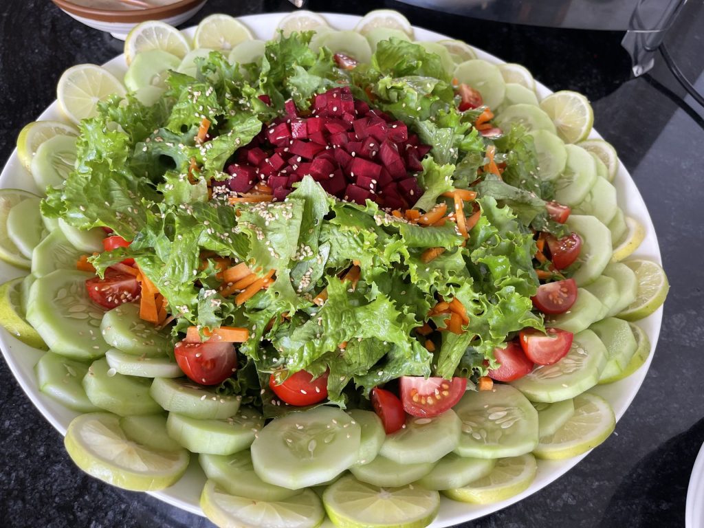 A garden salad of lettuce, cucumber, tomato and beetroot